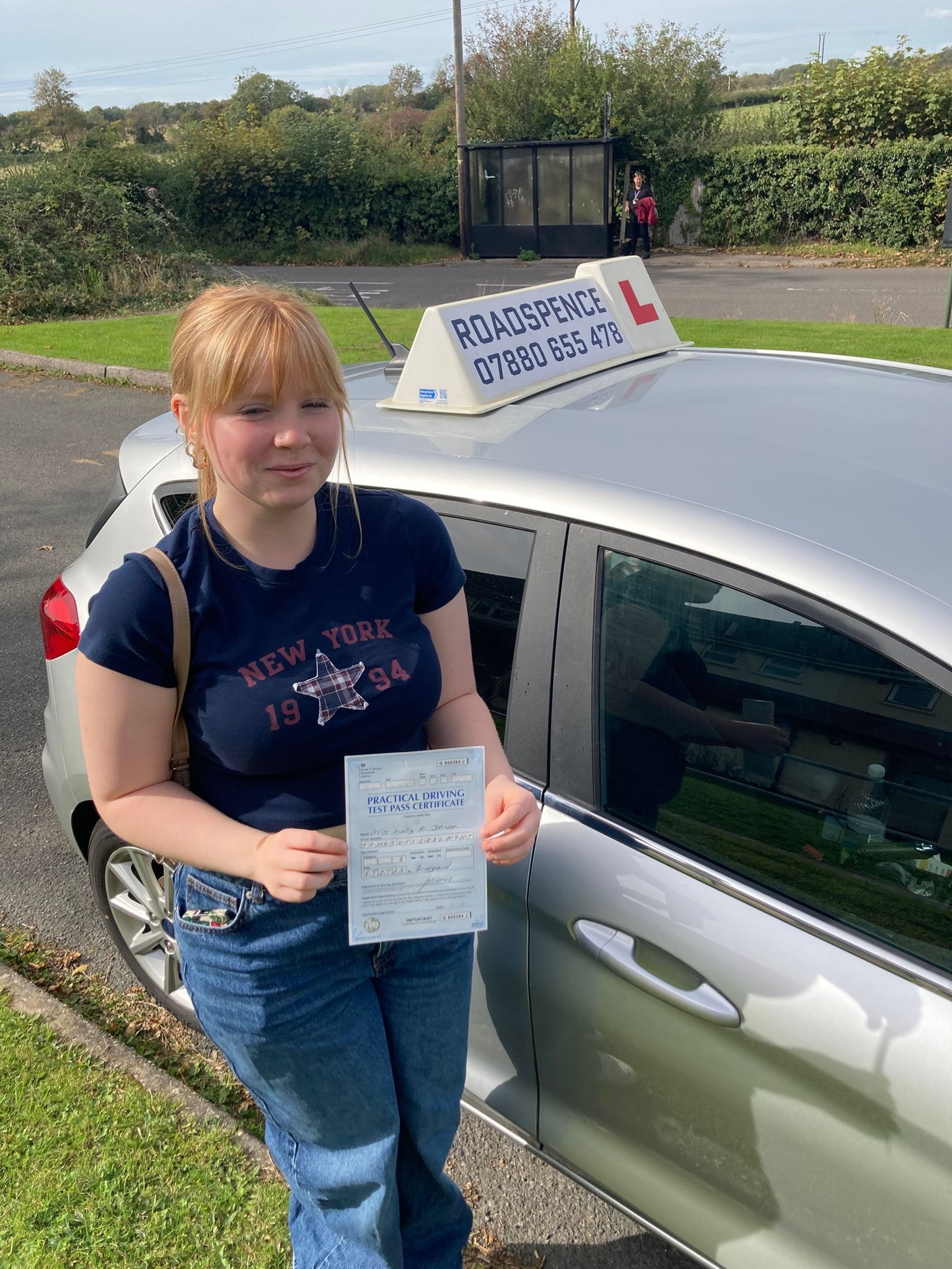 Lilly's image on pass day from RoadSpence driving school