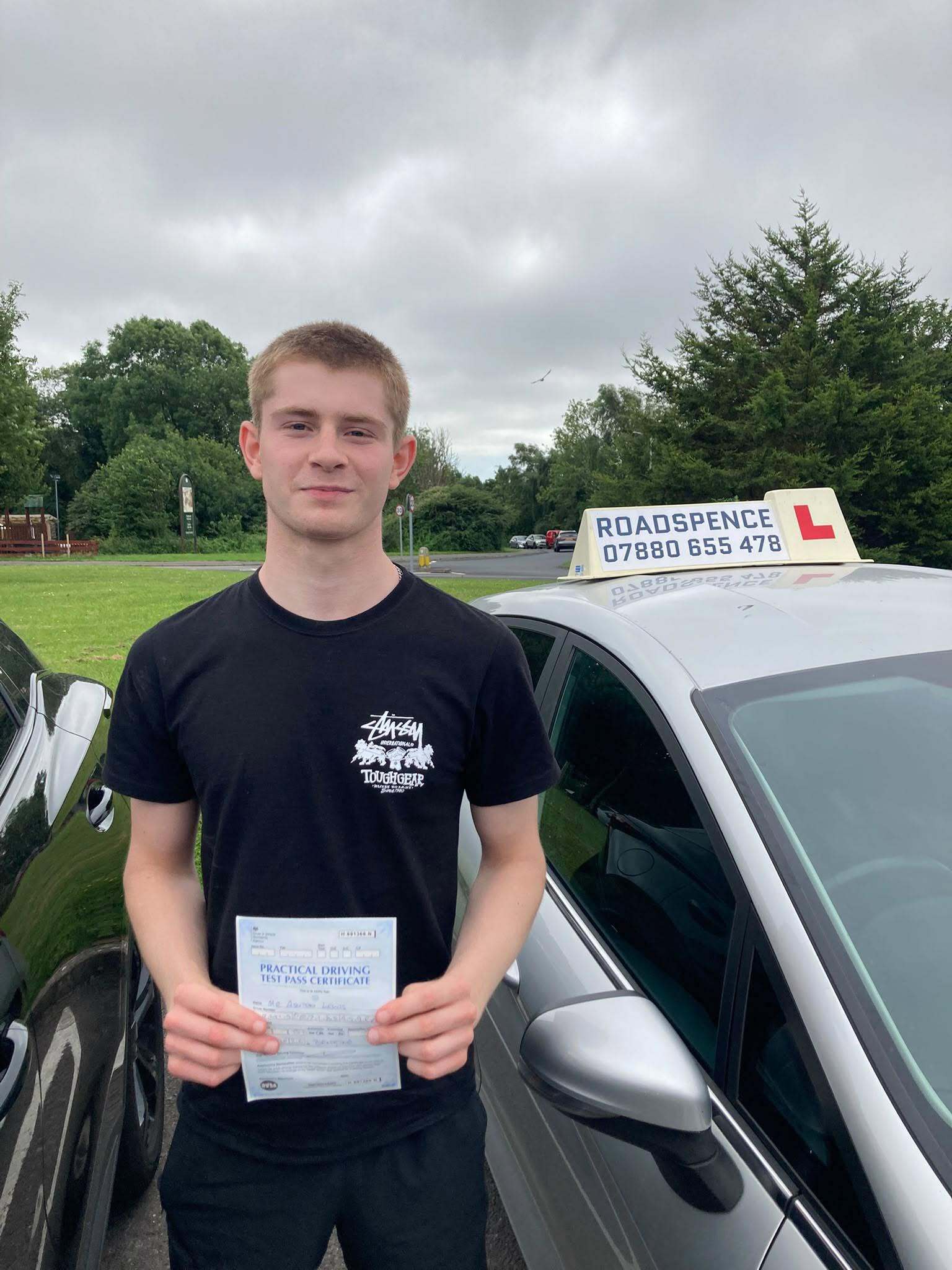 Adam's image on pass day from RoadSpence driving school